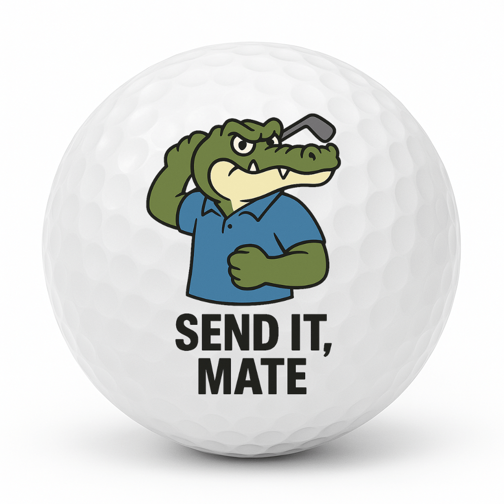 Cartoon crocodile golfer fist pumping with a golf club behind his head and the text Send It Mate on a white golf ball.