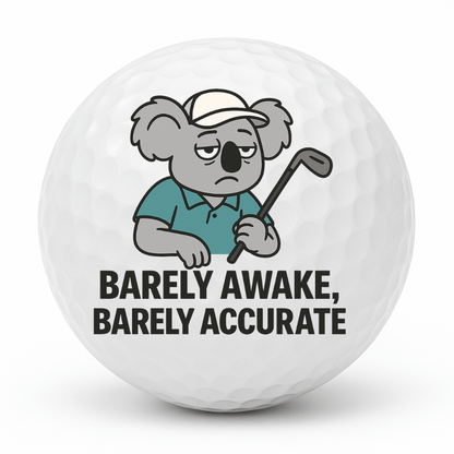Sleepy koala holding a golf club with the text Barely Awake Barely Accurate printed on a novelty golf ball.